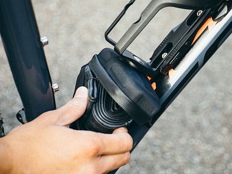 Фото Флягодержатель Topeak Ninja Pouch+ Mountain со встроенными монтажками и отсеком для камеры TNJ-PPM. Купить Флягодержатель Topeak Ninja Pouch+ Mountain со встроенными монтажками и отсеком для камеры TNJ-PPM  в Санкт-Петербурге, доставка по России